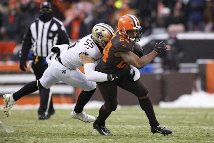 Dec 24, 2022; New Orleans Saints linebacker Kaden Elliss (55) tackles Cleveland Browns running back Nick Chubb (24). Mandatory Credit: Scott Galvin-USA TODAY